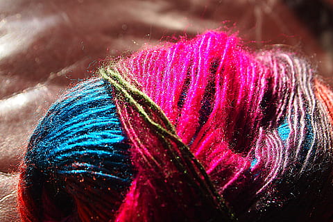 HiggIndex认证对纺织可持续服装降低资源消耗